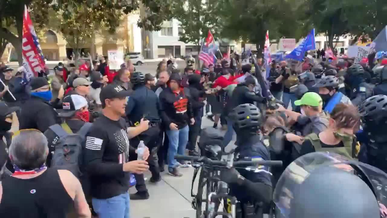 Patriots march to Caesar Chavez Plaza