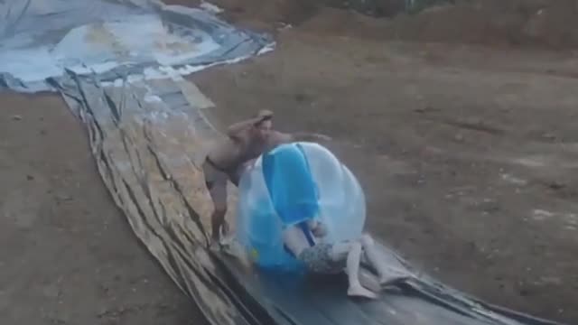Collab copyright protection - inflatable ball slip and slide slam