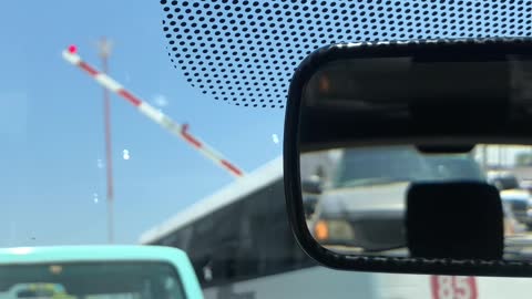 Bus Barely Avoids Incoming Train