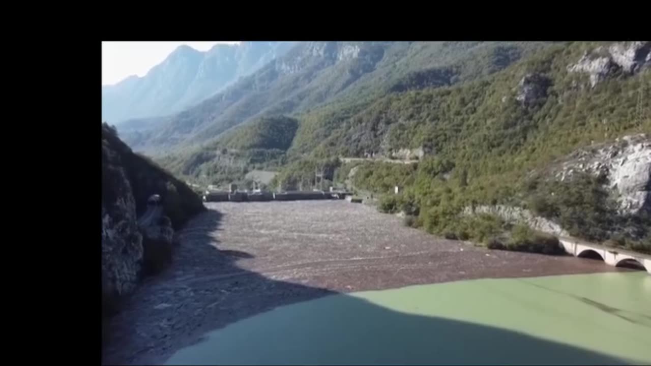 Tons of rubbish clogs river in Bosnia after flash floods and landslides