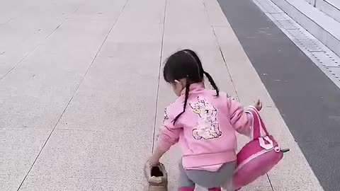 Cute baby away her bag