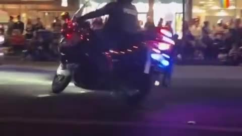 Police motorcycle crashes into people