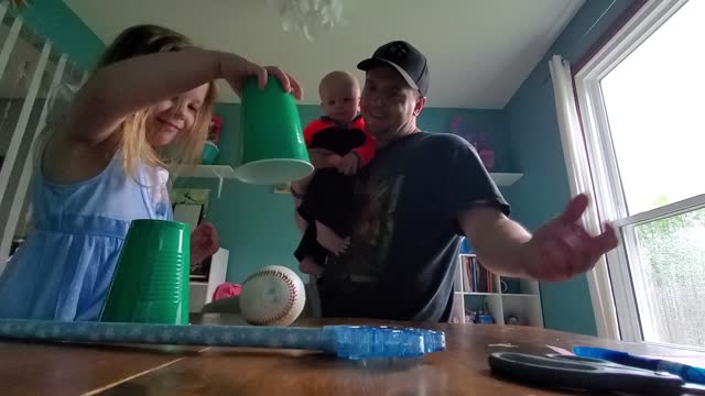 Four-Year-Old Baffled by Magic Ball Trick