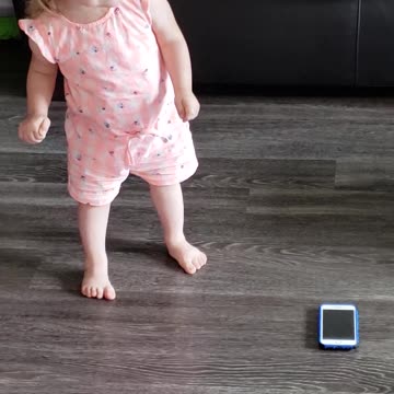 Little girl dancing to The Electric Slide