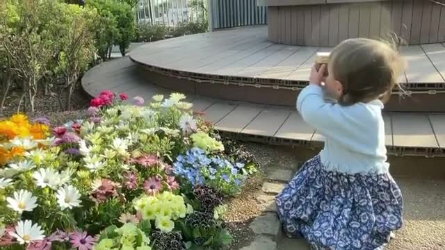 Cute baby girl taking pictures