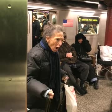 Old woman calls subway riders joke