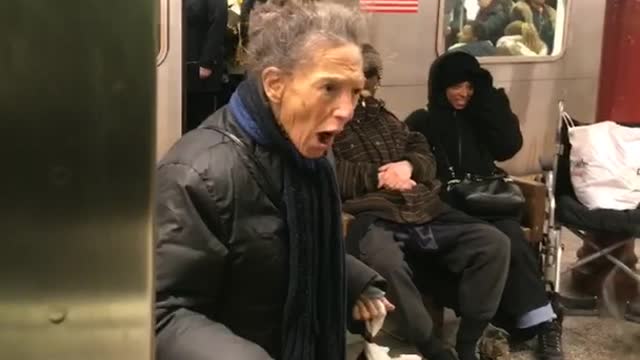 Old woman calls subway riders joke