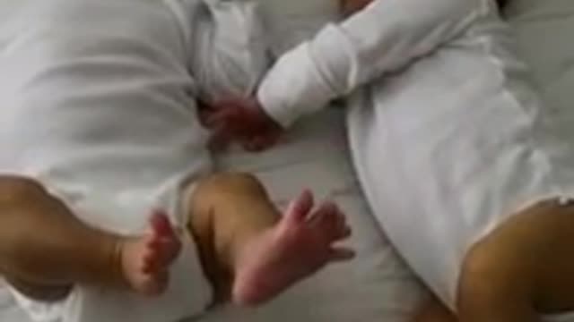 Adorable sleeping twins will leave you in awe!