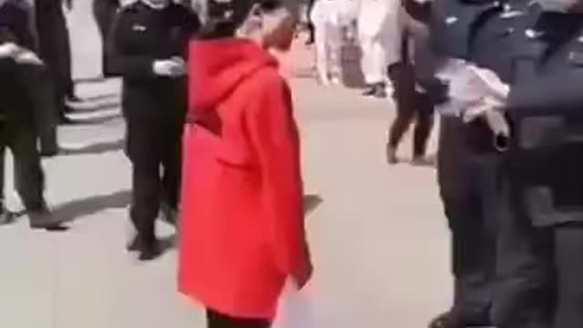 Chinese Police Violently Arrests Woman Without Mask