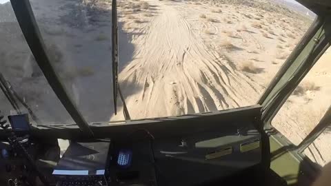 Connor driving in desert