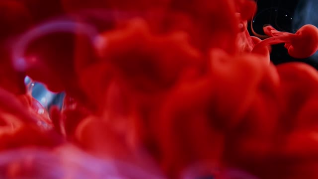 high-speed-photography-of-red-ink-diffusion-in-water