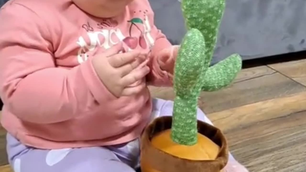 Cute baby playing with toy