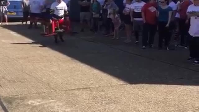 Collab copyright protection - strongman red shorts weights carry