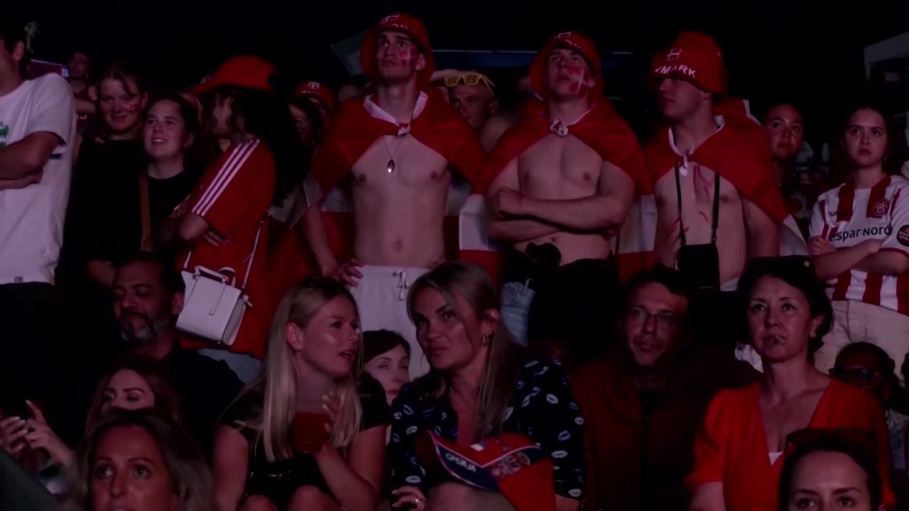 Denmark fans celebrate reaching Euro knockouts