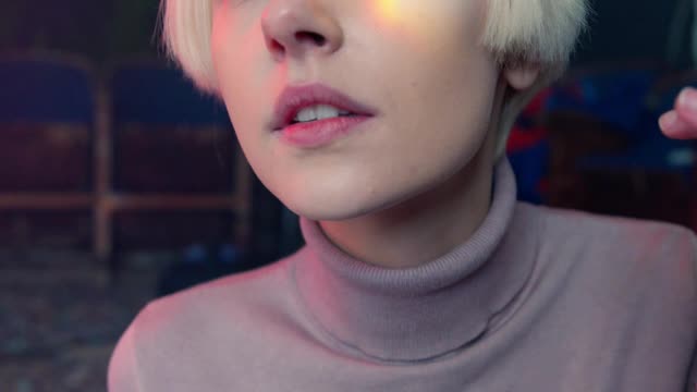 Rainbow colored reflection on human's face