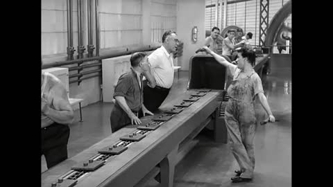 Charlie Chaplin in factory