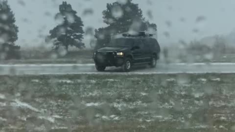 Driver Fishtails on I-80 in Snowy Conditions