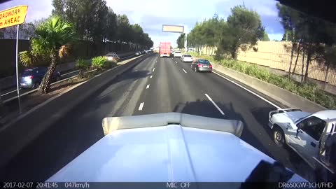 Distracted Motorbike Rider Lands in Truck Bed