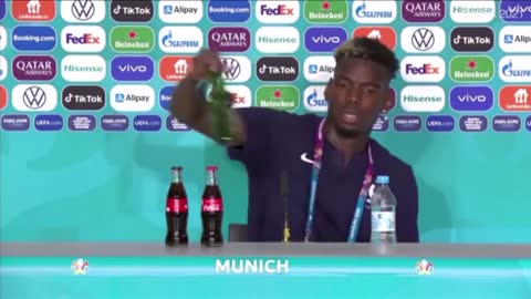 Paul Pogba removes Heineken bottle news conference