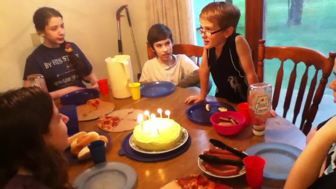 Xander blows out his birthday candles