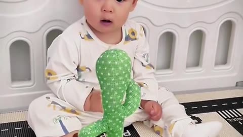 Baby on cutout toy 🧸🪀