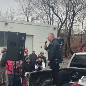 Speech being given at Adamson BBQ