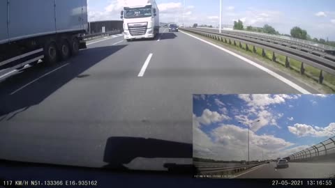 Parked car in the left lane of the highway (Poland)