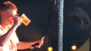 Guy Tries to Record Concert with Wallet