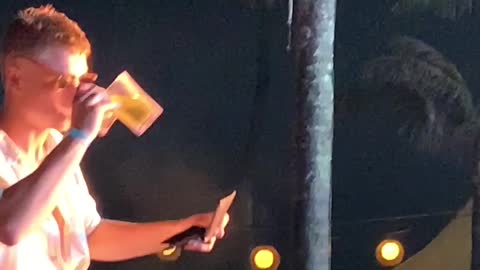 Guy Tries to Record Concert with Wallet