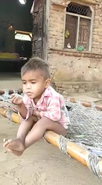 Small boy smoking the joint like adult.