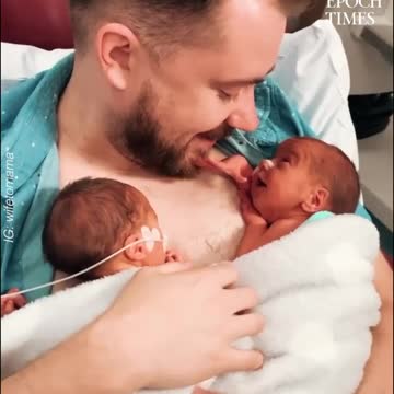 Dad holding newborn twins ❤️❤️