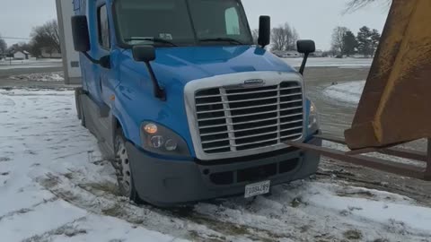 Bogged Truck's Radiator Punctured by Backhoe