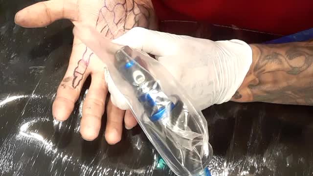 Auto tattoo hand
