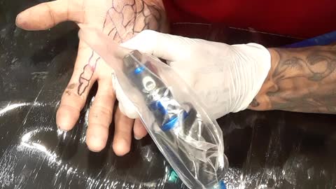 Auto tattoo hand