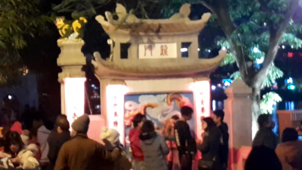 Crowed with people welcome New Year at Ngoc Son Temple