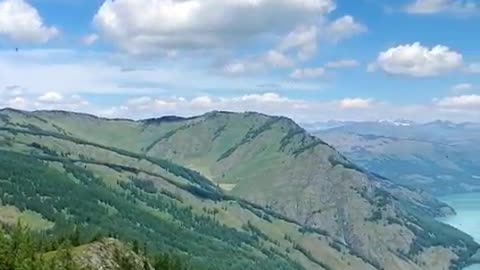 Clouds and mist swirled before my eyes, and the mountains were green