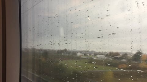 Traveling by train on a rainy day