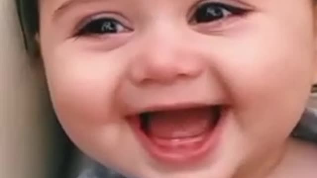 Cute baby laughing