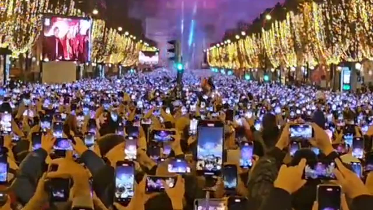 Internet users upset with attendees in Paris shown recording New Years celebrations