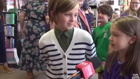 Tim Walz's Wife Reads Books About Gay Dads Caring for Cats to Kids on the Campaign Trail