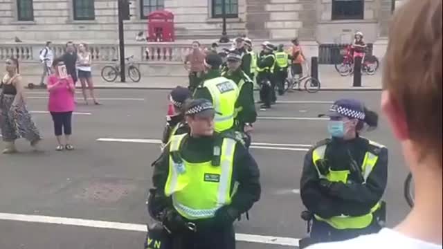 Boy stands tall over police