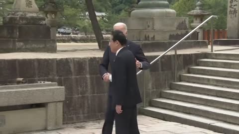 Biden almost falls down the stairs AGAIN