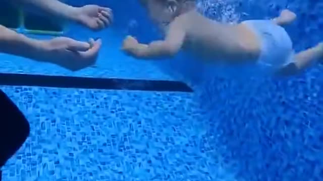 baby swimming