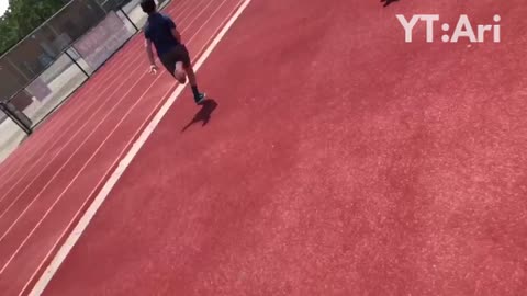 Skateboarding kid on track falls face first into high jump mat