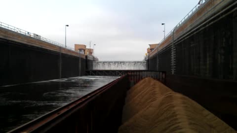 Sailing thru Illinois River Locks-Raising the barges.