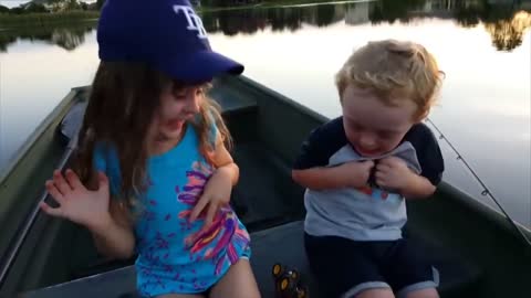 Baby and fish kissing