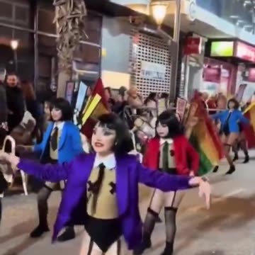 Children who participate in carnival in Spain dress in girls...