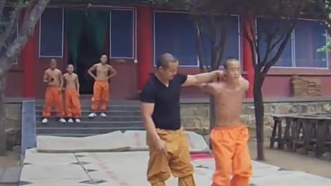 Shaolin master teaches backflip