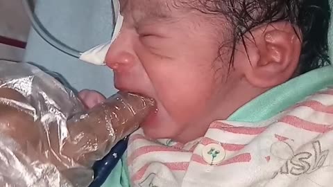 New Born Baby suctioning and fluies noise mouth