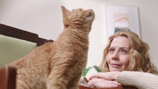 A Woman Adoring Her Cat